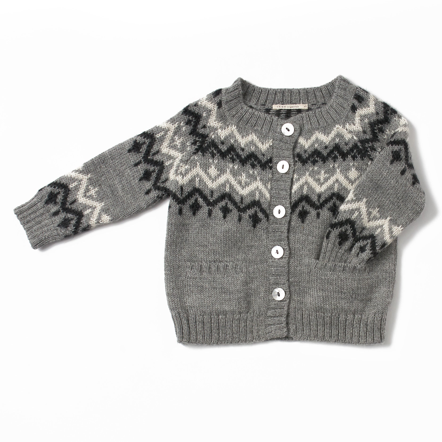dark grey, crew neck cardigan with a fair isle pattern, has natural shell buttons, handmade with 100% baby alpaca, has two front pockets on the bottom