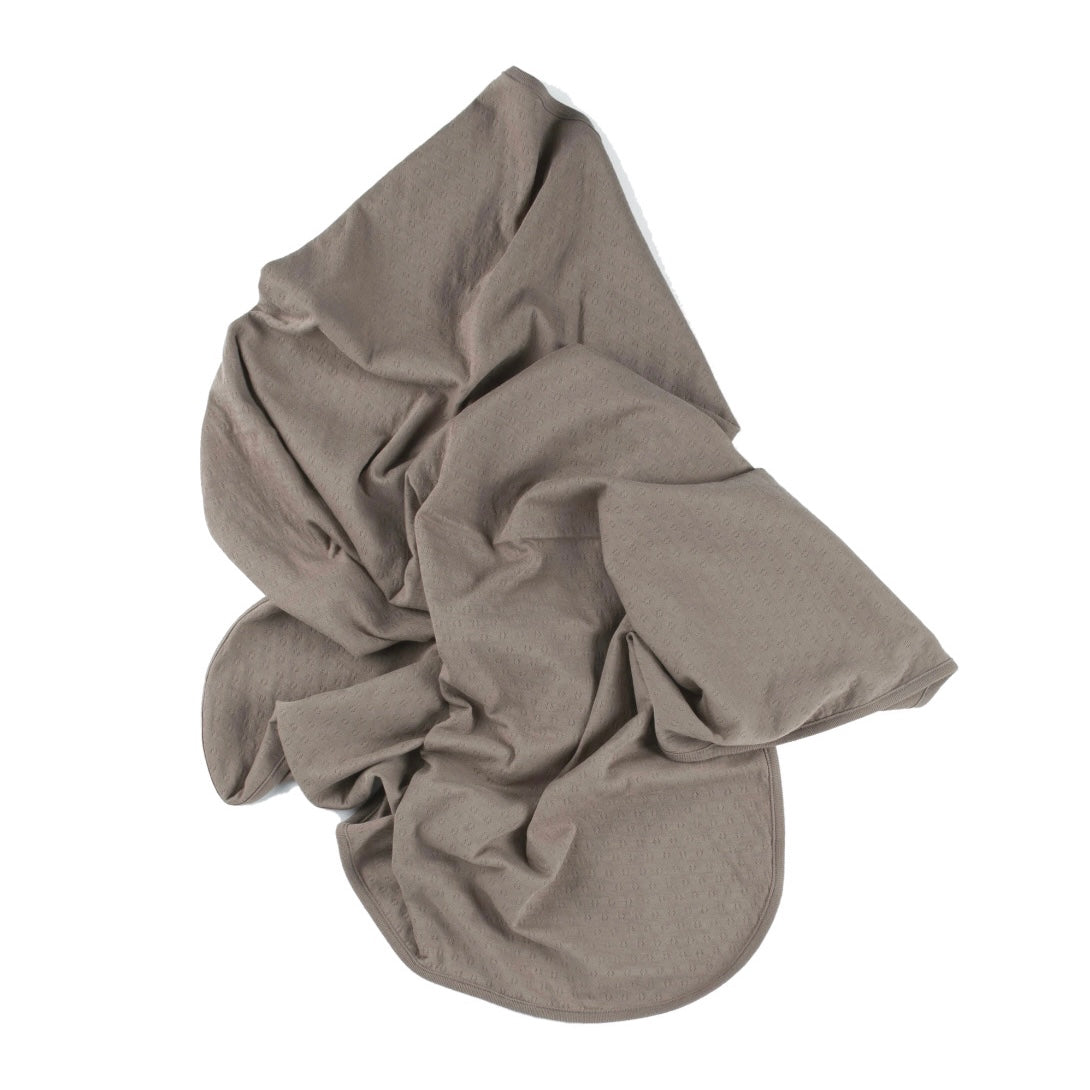 brown pointelle ribbed knit double layered essential swaddle blanket. 33" x 33".  100% organic cotton.