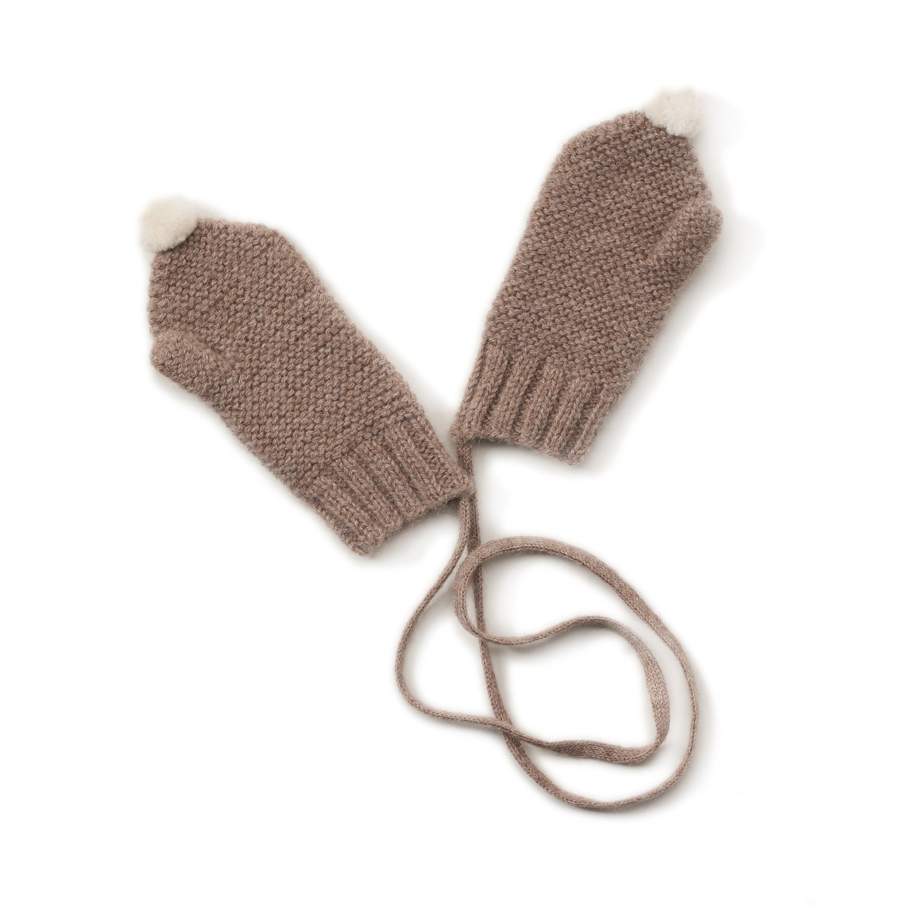 dark tan mittens with white pom atop, cord for inside sleefves, handmade with 100% melanged alpaca